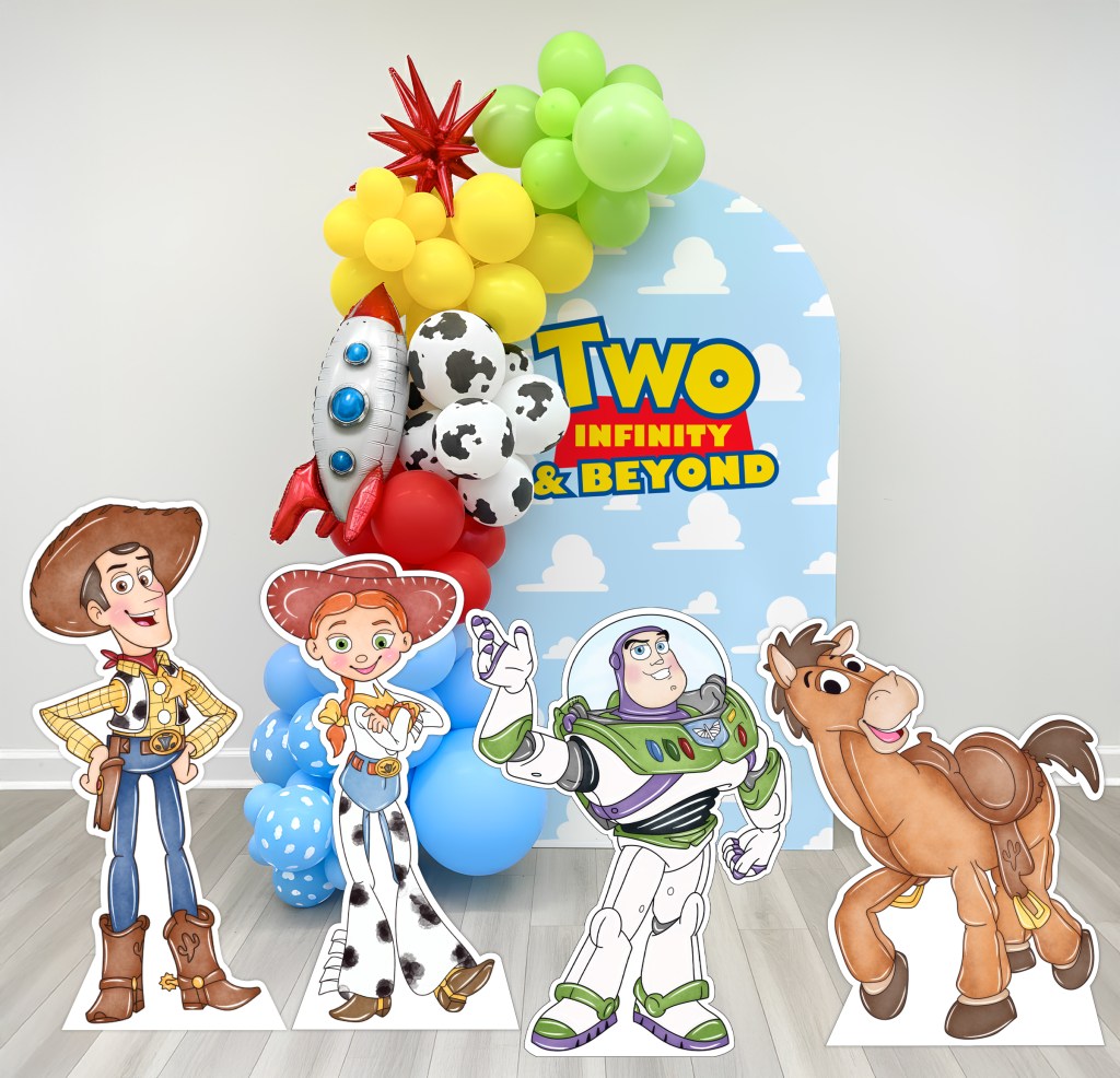 Toy Story character cutouts for two infinity and beyond party backdrop